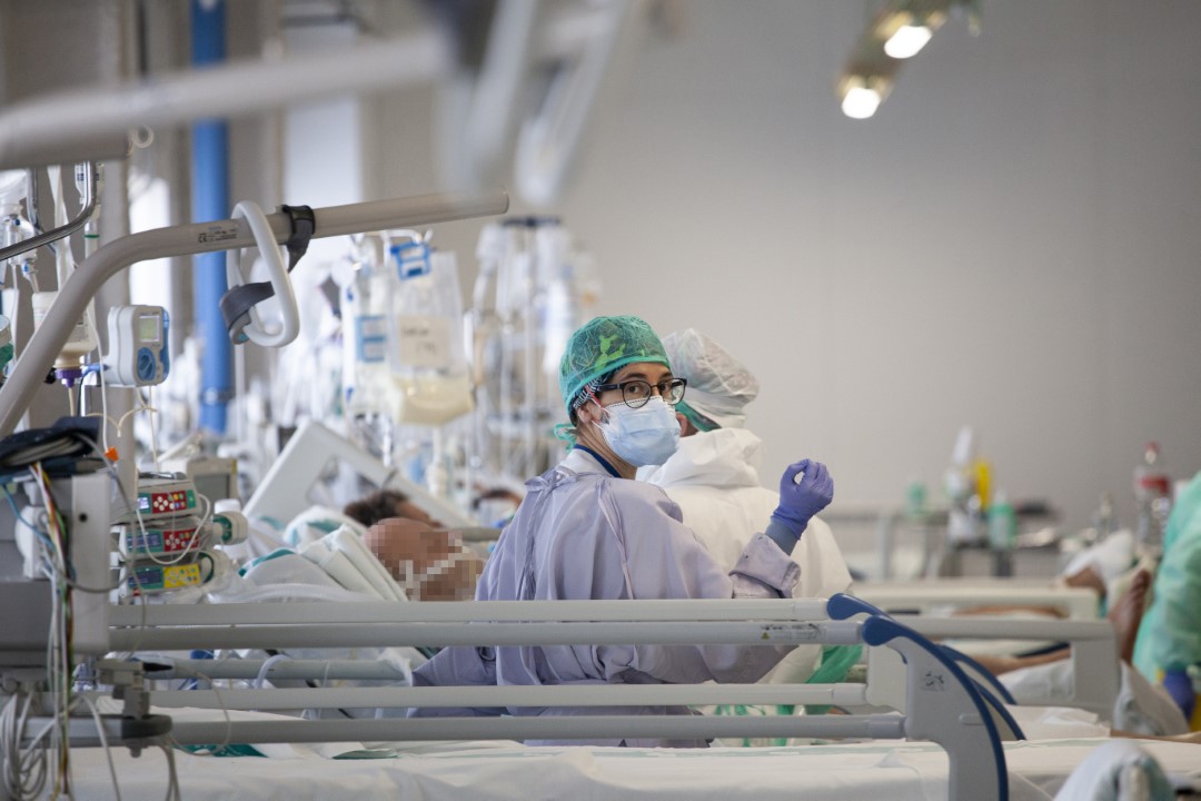 Plant enabled as an Intensive Care Unit (ICU) of the Hospital Taulí of Sabadell with patients with COVID-19. In the image, a doctor with a patient. April 8, 2020; Sabadell, Barcelona.